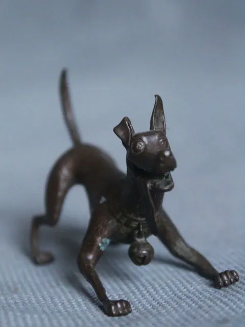 Signed Japanese bronze okimono jizai playful dog with articulated bell