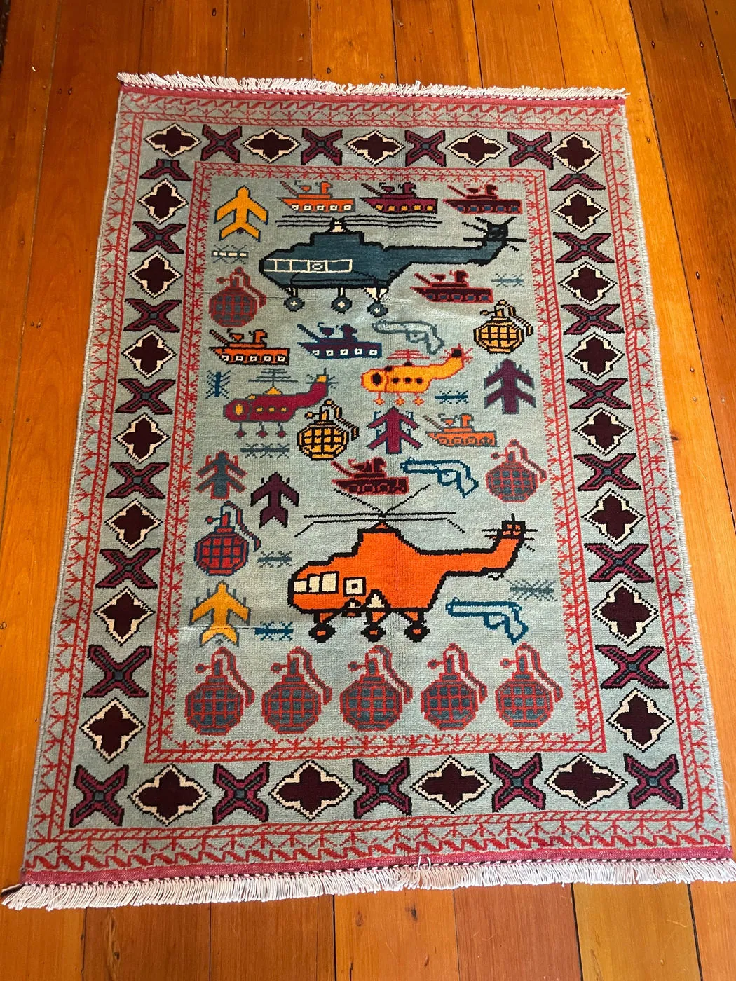 Afghan War Rug #990: pale blue, with helicopters, tanks and hand grenades, 126 x 90 cm, photo 1 of 4
