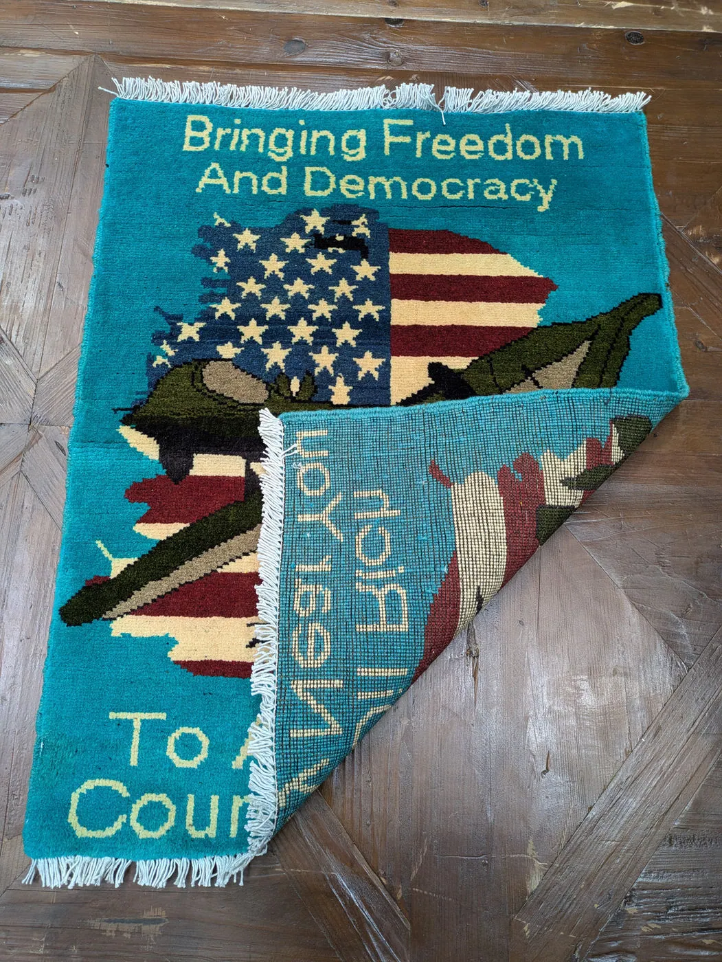 Afghan War Rug #2000: turquoise, with a US flag, aircraft and Bringing Freedom And Democracy, 80 x 60 cm, photo 4 of 8