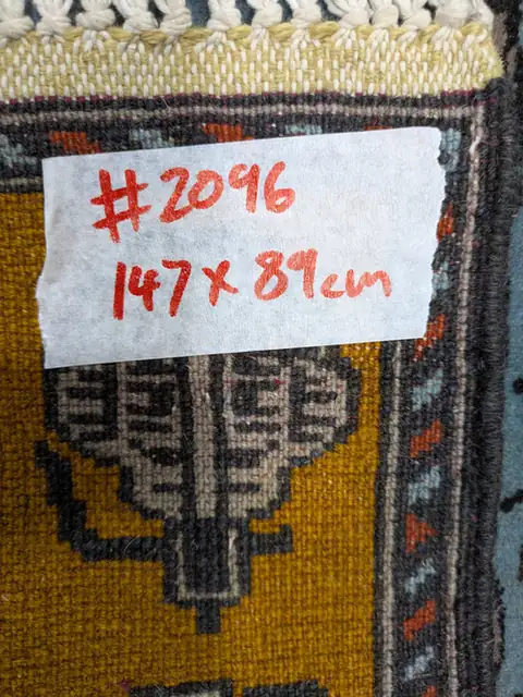 The back of rug 2096 with its size tag