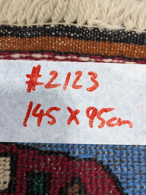 The back of rug 2123 with its size tag